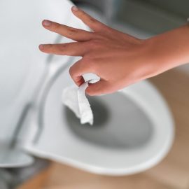 Throwing foreign object in toilet